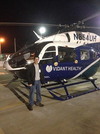 Student with a Vidant Helath hellicopter